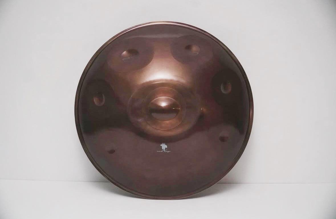 청동, 갑옷, 예술이(가) 표시된 사진  자동 생성된 설명